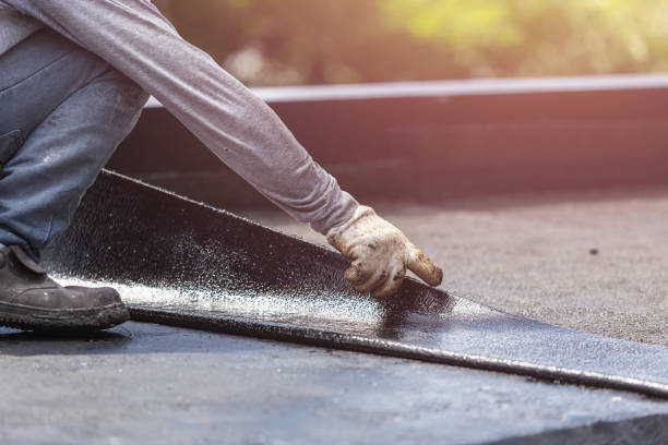 Professional Basement Waterproofing technician working in Barboursville, VA